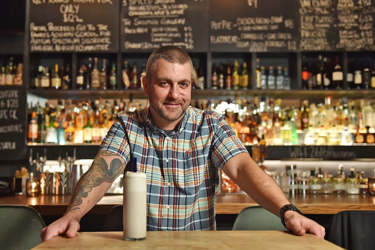 Justin Taylor with his Candy Cane Fizz at The Cascade Room. Photo: Dan Toulgoet