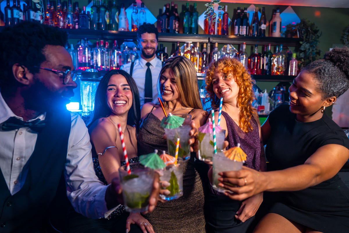 smiling-friends-enjoying-drinks-at-a-festive-bar-2026-03-25-03-57-35-utc PiDGiN